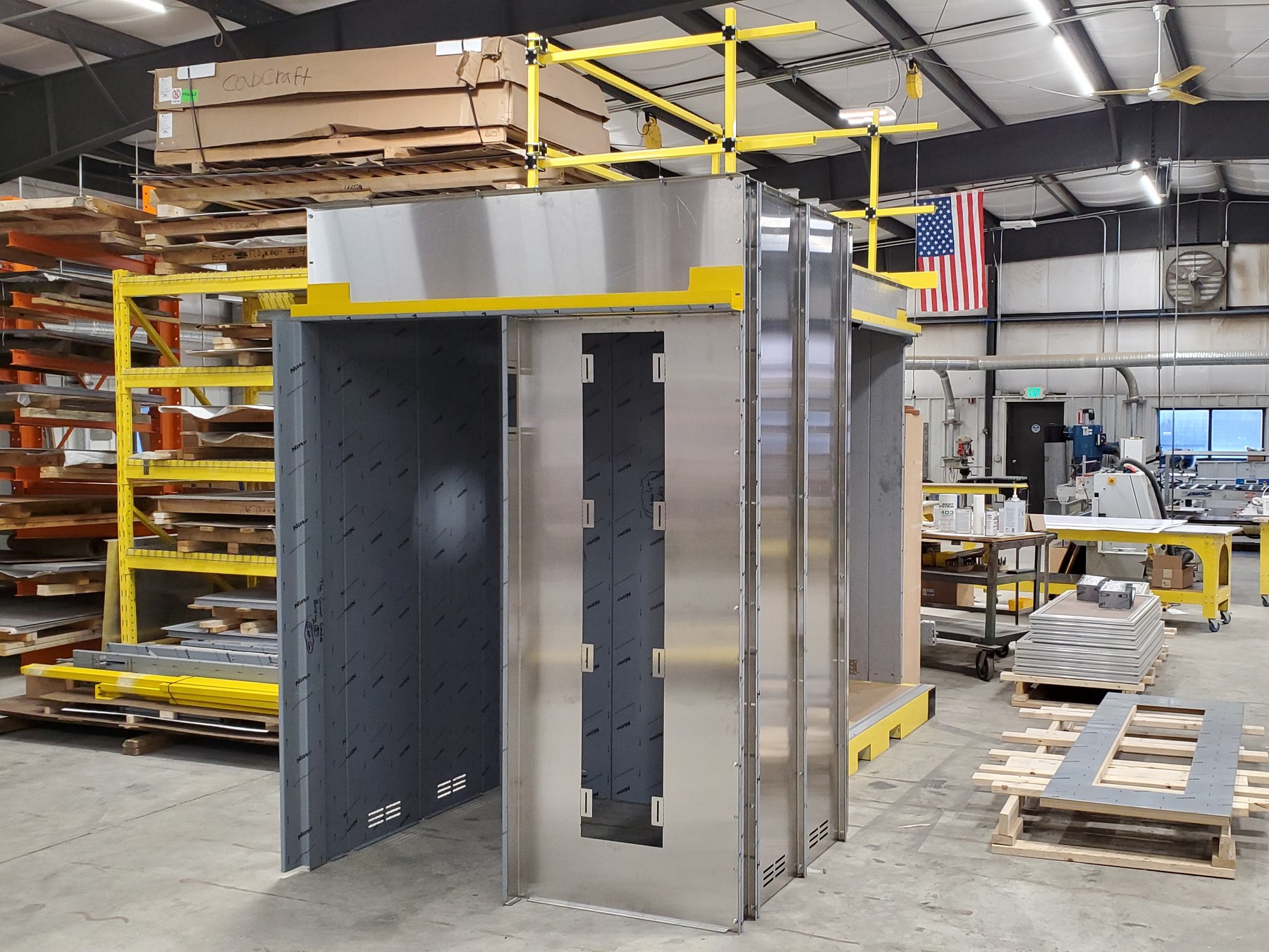 A stainless steel elevator cab shell fabricated by CabCraft